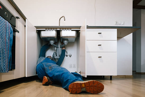 Professional Emergency Plumber technician working in Covert, MI